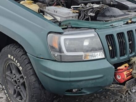 Зелений Джип Grand Cherokee, об'ємом двигуна 4.7 л та пробігом 300 тис. км за 2000 $, фото 1 на Automoto.ua