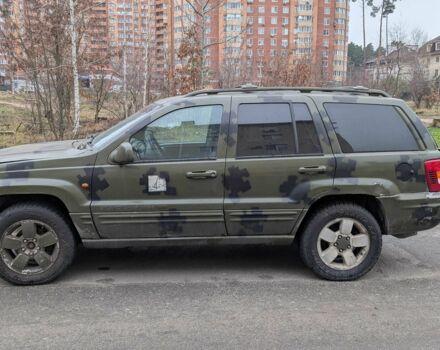 Зелений Джип Grand Cherokee, об'ємом двигуна 3.1 л та пробігом 270 тис. км за 1800 $, фото 1 на Automoto.ua