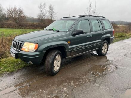 Зеленый Джип Гранд Чероки, объемом двигателя 3.1 л и пробегом 220 тыс. км за 3800 $, фото 1 на Automoto.ua