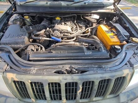 Зеленый Джип Гранд Чероки, объемом двигателя 2.7 л и пробегом 2 тыс. км за 3500 $, фото 1 на Automoto.ua