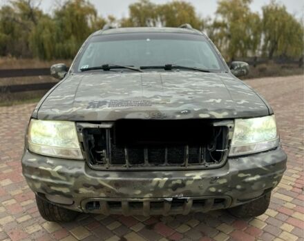 Зеленый Джип Гранд Чероки, объемом двигателя 2.7 л и пробегом 222 тыс. км за 3800 $, фото 1 на Automoto.ua