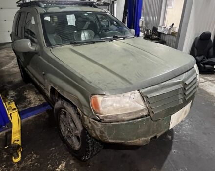 Зеленый Джип Гранд Чероки, объемом двигателя 0 л и пробегом 300 тыс. км за 1421 $, фото 1 на Automoto.ua