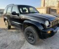 Черный Джип Либерти, объемом двигателя 2.5 л и пробегом 234 тыс. км за 2800 $, фото 1 на Automoto.ua