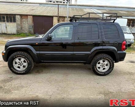 Черный Джип Либерти, объемом двигателя 2.5 л и пробегом 244 тыс. км за 3500 $, фото 1 на Automoto.ua