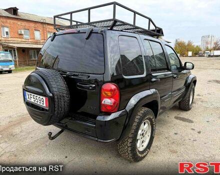 Черный Джип Либерти, объемом двигателя 2.5 л и пробегом 244 тыс. км за 3500 $, фото 5 на Automoto.ua