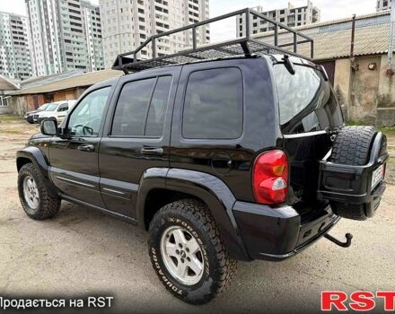 Черный Джип Либерти, объемом двигателя 2.5 л и пробегом 244 тыс. км за 3500 $, фото 2 на Automoto.ua