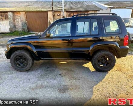 Черный Джип Либерти, объемом двигателя 2.5 л и пробегом 234 тыс. км за 2800 $, фото 1 на Automoto.ua