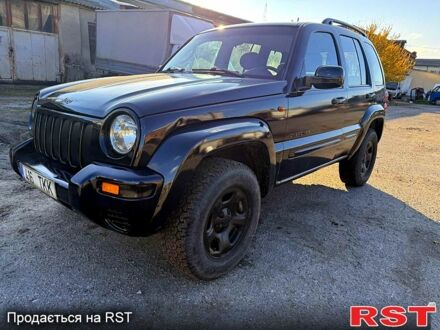 Черный Джип Либерти, объемом двигателя 2.5 л и пробегом 234 тыс. км за 2800 $, фото 1 на Automoto.ua