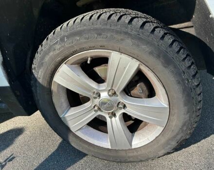 Белый Джип Патриот, объемом двигателя 2.36 л и пробегом 167 тыс. км за 12300 $, фото 3 на Automoto.ua