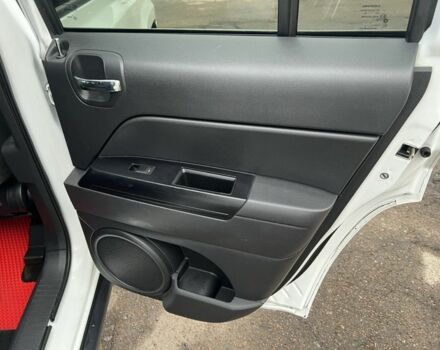 Белый Джип Патриот, объемом двигателя 2 л и пробегом 210 тыс. км за 8500 $, фото 10 на Automoto.ua