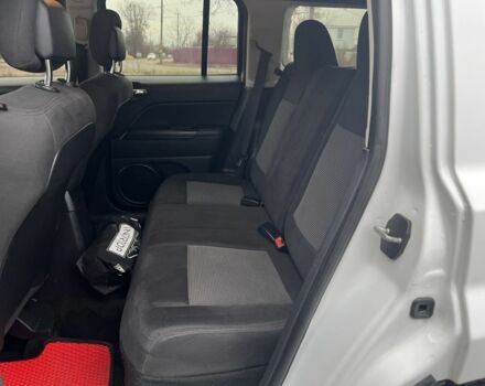 Белый Джип Патриот, объемом двигателя 2 л и пробегом 210 тыс. км за 8500 $, фото 11 на Automoto.ua