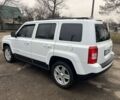 Белый Джип Патриот, объемом двигателя 2 л и пробегом 210 тыс. км за 8500 $, фото 1 на Automoto.ua