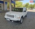 Білий Джип Patriot, об'ємом двигуна 2.36 л та пробігом 265 тис. км за 9600 $, фото 1 на Automoto.ua