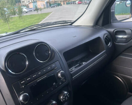 Білий Джип Patriot, об'ємом двигуна 2 л та пробігом 184 тис. км за 9950 $, фото 9 на Automoto.ua