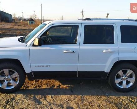 Белый Джип Патриот, объемом двигателя 2.4 л и пробегом 160 тыс. км за 12000 $, фото 3 на Automoto.ua