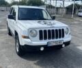 Білий Джип Patriot, об'ємом двигуна 2 л та пробігом 170 тис. км за 8700 $, фото 1 на Automoto.ua