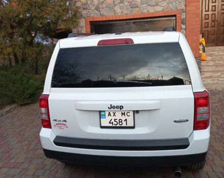 Белый Джип Патриот, объемом двигателя 2.36 л и пробегом 95 тыс. км за 10200 $, фото 4 на Automoto.ua