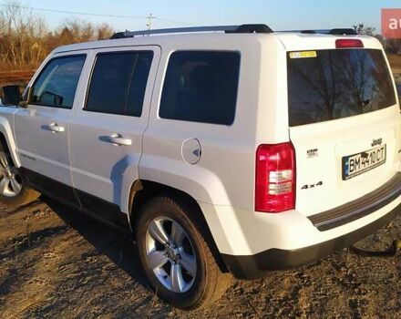 Белый Джип Патриот, объемом двигателя 2.4 л и пробегом 160 тыс. км за 12000 $, фото 4 на Automoto.ua