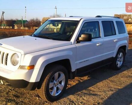 Белый Джип Патриот, объемом двигателя 2.4 л и пробегом 160 тыс. км за 12000 $, фото 2 на Automoto.ua