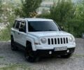 Белый Джип Патриот, объемом двигателя 2.4 л и пробегом 275 тыс. км за 8250 $, фото 1 на Automoto.ua