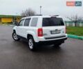 Білий Джип Patriot, об'ємом двигуна 2.4 л та пробігом 113 тис. км за 11300 $, фото 5 на Automoto.ua