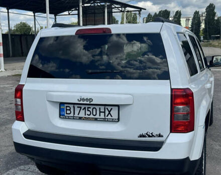 Білий Джип Patriot, об'ємом двигуна 2 л та пробігом 140 тис. км за 8200 $, фото 1 на Automoto.ua