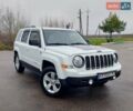 Білий Джип Patriot, об'ємом двигуна 2.4 л та пробігом 113 тис. км за 11300 $, фото 1 на Automoto.ua