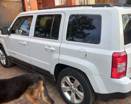 Белый Джип Патриот, объемом двигателя 2.36 л и пробегом 95 тыс. км за 10200 $, фото 3 на Automoto.ua