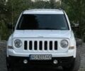 Белый Джип Патриот, объемом двигателя 2.4 л и пробегом 275 тыс. км за 8250 $, фото 1 на Automoto.ua