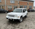 Білий Джип Patriot, об'ємом двигуна 2 л та пробігом 243 тис. км за 6750 $, фото 1 на Automoto.ua