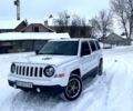 Білий Джип Patriot, об'ємом двигуна 2.4 л та пробігом 128 тис. км за 9700 $, фото 1 на Automoto.ua