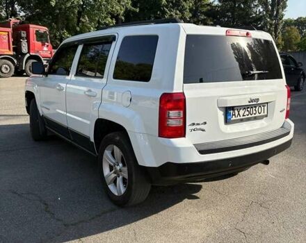 Белый Джип Патриот, объемом двигателя 2.36 л и пробегом 170 тыс. км за 11500 $, фото 1 на Automoto.ua