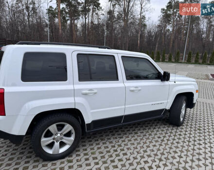 Білий Джип Patriot, об'ємом двигуна 2.36 л та пробігом 140 тис. км за 9800 $, фото 3 на Automoto.ua
