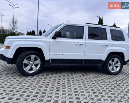 Білий Джип Patriot, об'ємом двигуна 2.36 л та пробігом 140 тис. км за 9800 $, фото 2 на Automoto.ua