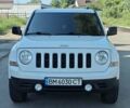 Белый Джип Патриот, объемом двигателя 2.4 л и пробегом 169 тыс. км за 11900 $, фото 1 на Automoto.ua
