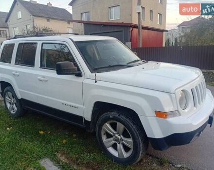 Белый Джип Патриот, объемом двигателя 2.36 л и пробегом 160 тыс. км за 8800 $, фото 2 на Automoto.ua