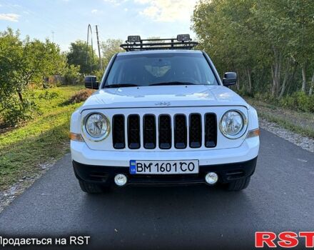Белый Джип Патриот, объемом двигателя 2.4 л и пробегом 82 тыс. км за 11200 $, фото 1 на Automoto.ua