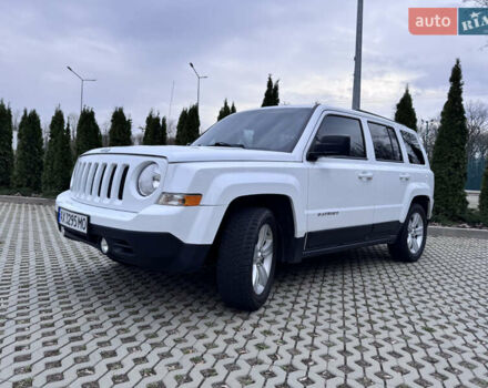 Білий Джип Patriot, об'ємом двигуна 2.36 л та пробігом 140 тис. км за 9800 $, фото 1 на Automoto.ua