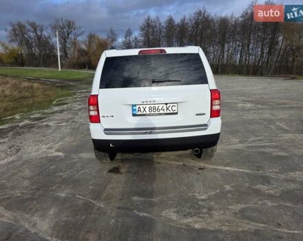 Белый Джип Патриот, объемом двигателя 2.36 л и пробегом 104 тыс. км за 11500 $, фото 4 на Automoto.ua