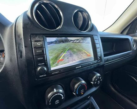 Білий Джип Patriot, об'ємом двигуна 2 л та пробігом 125 тис. км за 2100 $, фото 10 на Automoto.ua