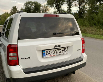 Білий Джип Patriot, об'ємом двигуна 2.36 л та пробігом 220 тис. км за 9000 $, фото 1 на Automoto.ua