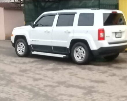 Белый Джип Патриот, объемом двигателя 2.36 л и пробегом 238 тыс. км за 10000 $, фото 1 на Automoto.ua