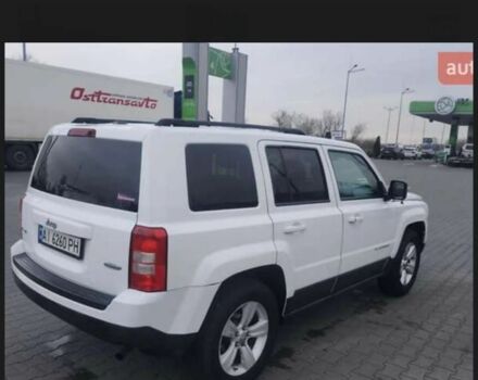 Белый Джип Патриот, объемом двигателя 2.4 л и пробегом 325 тыс. км за 8500 $, фото 1 на Automoto.ua