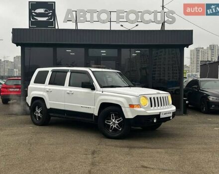 Белый Джип Патриот, объемом двигателя 2 л и пробегом 220 тыс. км за 8490 $, фото 1 на Automoto.ua