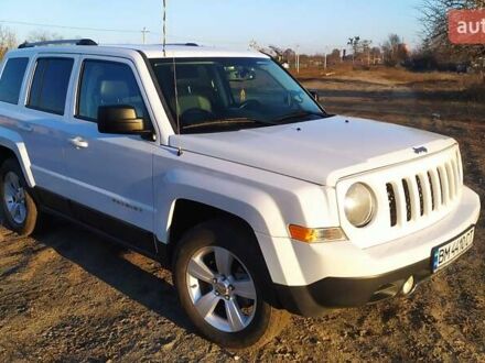 Белый Джип Патриот, объемом двигателя 2.4 л и пробегом 160 тыс. км за 12000 $, фото 1 на Automoto.ua