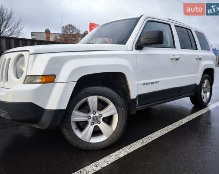 Білий Джип Patriot, об'ємом двигуна 2.4 л та пробігом 179 тис. км за 8850 $, фото 1 на Automoto.ua