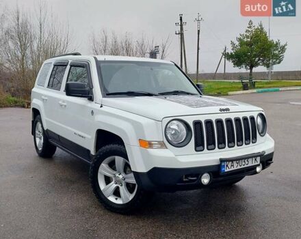 Білий Джип Patriot, об'ємом двигуна 2.4 л та пробігом 113 тис. км за 11300 $, фото 1 на Automoto.ua
