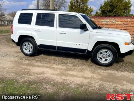 Білий Джип Patriot, об'ємом двигуна 2 л та пробігом 124 тис. км за 7900 $, фото 1 на Automoto.ua