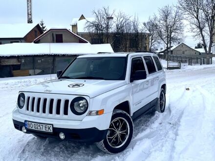 Білий Джип Patriot, об'ємом двигуна 2.4 л та пробігом 128 тис. км за 9700 $, фото 1 на Automoto.ua