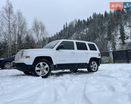 Белый Джип Патриот, объемом двигателя 2.36 л и пробегом 144 тыс. км за 10000 $, фото 1 на Automoto.ua